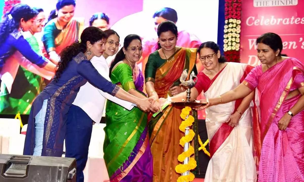 Minister for Health Vidadala Rajani, AP Women’s Commission chairperson Vasireddy Padma and others participating in a programme to mark International Women’s Day in Vijayawada on Tuesday
