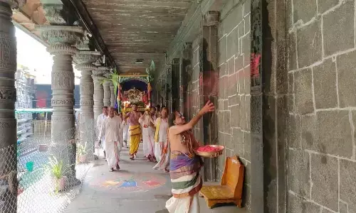 Priests celebrating ‘Vasantotsavam’, an annual festival of the Simhachalam Devasthanam in Visakhapatnam on Tuesday