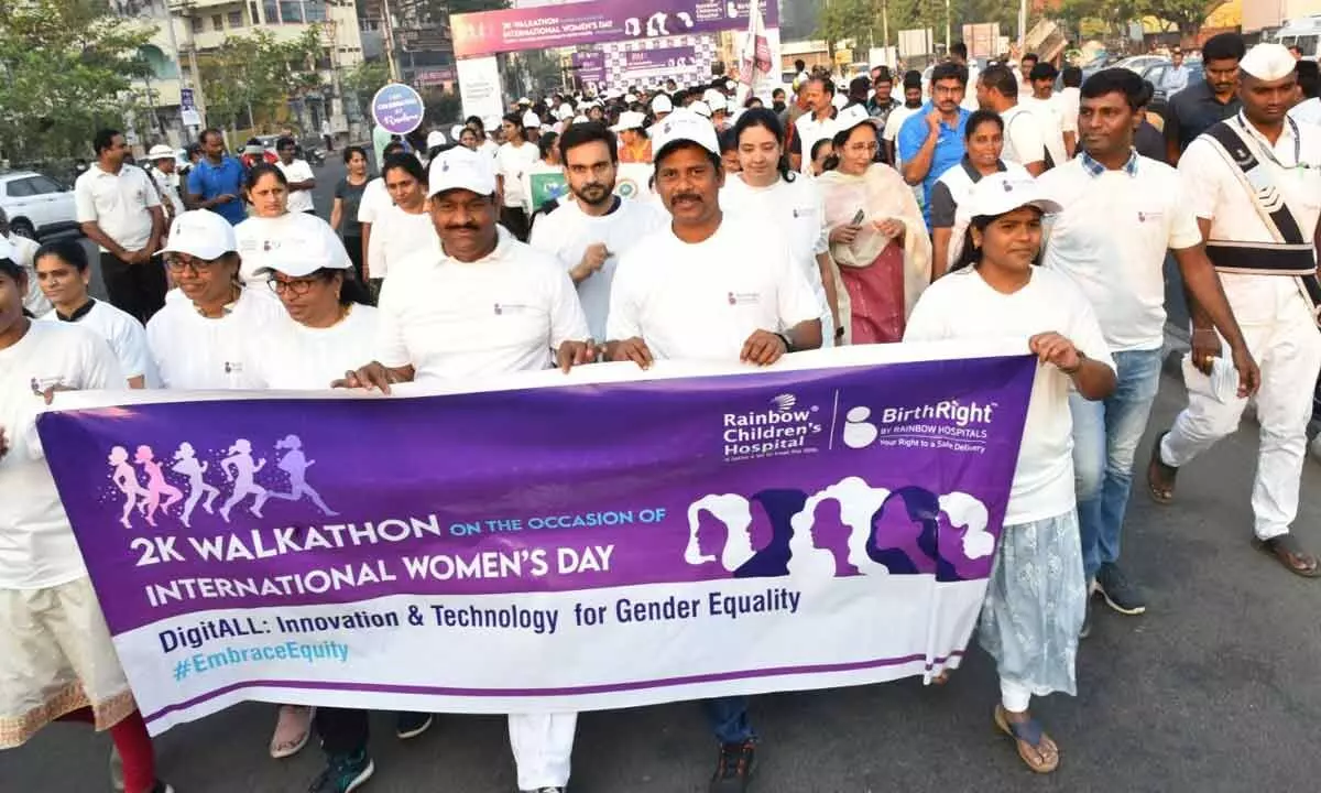District Collector S Dilli Rao and others participating in the Walkathon in Vijayawada on Wednesday