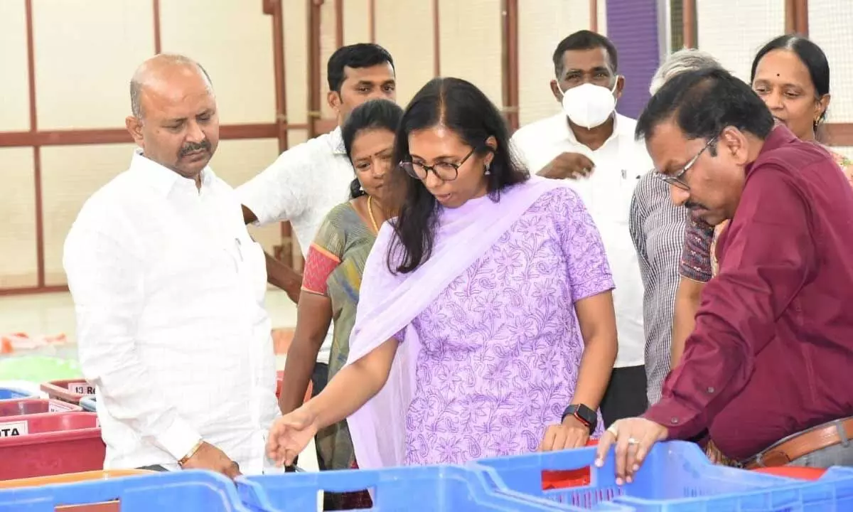 District Collector Nagalakshmi Selvarajan along with election observers Dr Pola Bhaskar and Hari Jawahar Lal inspecting the poll counting centre at JNTUA in Anantapur on Wednesday