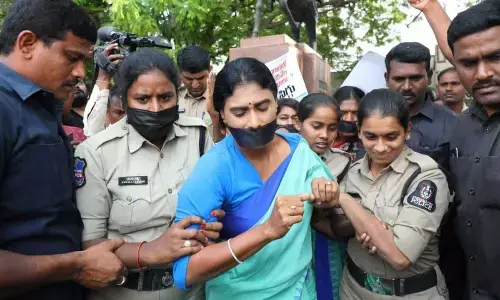 YS Sharmila stages protest at Tank Bund against alleged crimes against women, detained