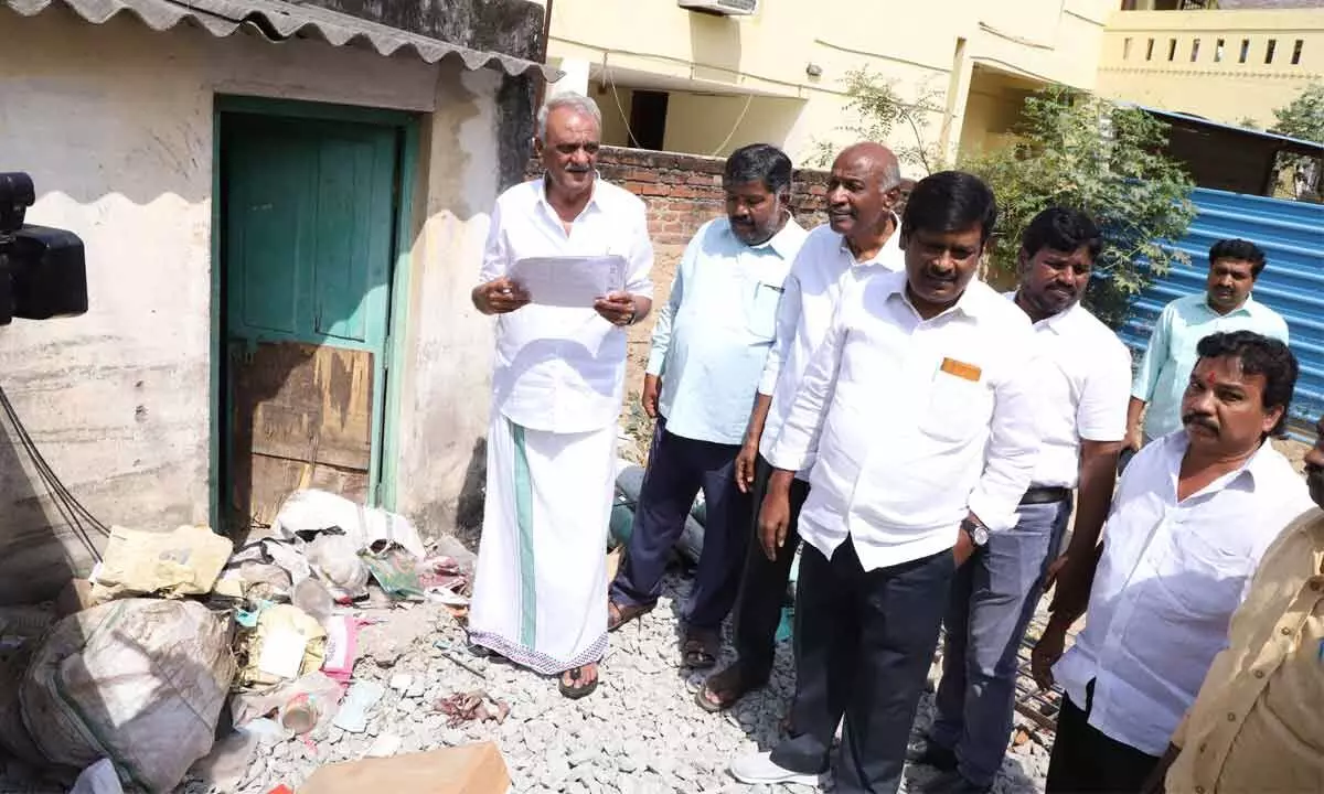 CPI national secretary K Narayana and other leaders at a house at Yashodanagar in Tirupati on Wednesday where 13 fake voters were reportedly registered