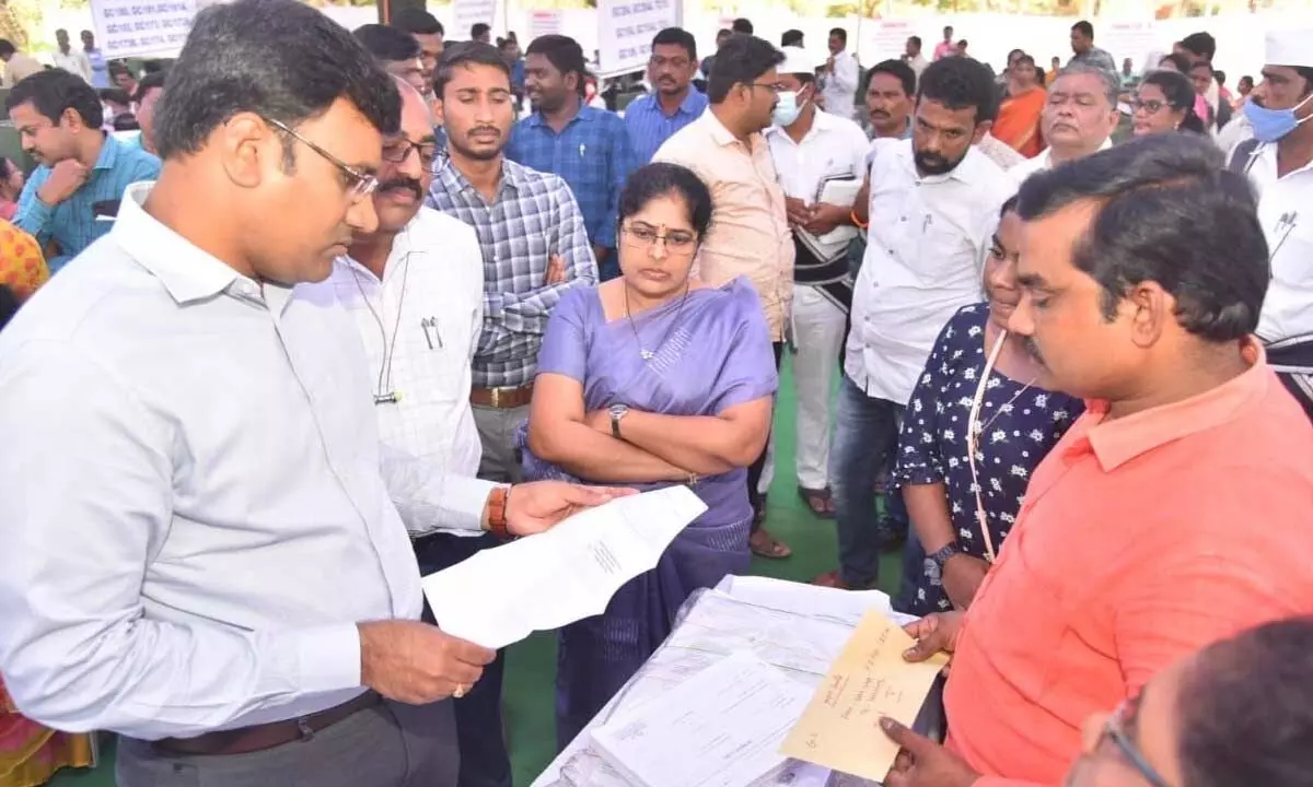 District Collector and Election Officer KVN Chakradhar Babu observing the polling material at DKW Govt College in Nellore on Sunday