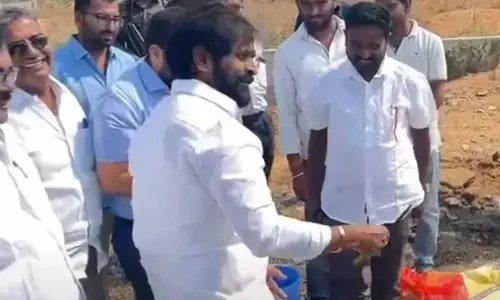 Minsiter Dr V Srinivas Goud along with other BRS leaders and officials taking part in a land breaking ceremony in the district on Sunday.