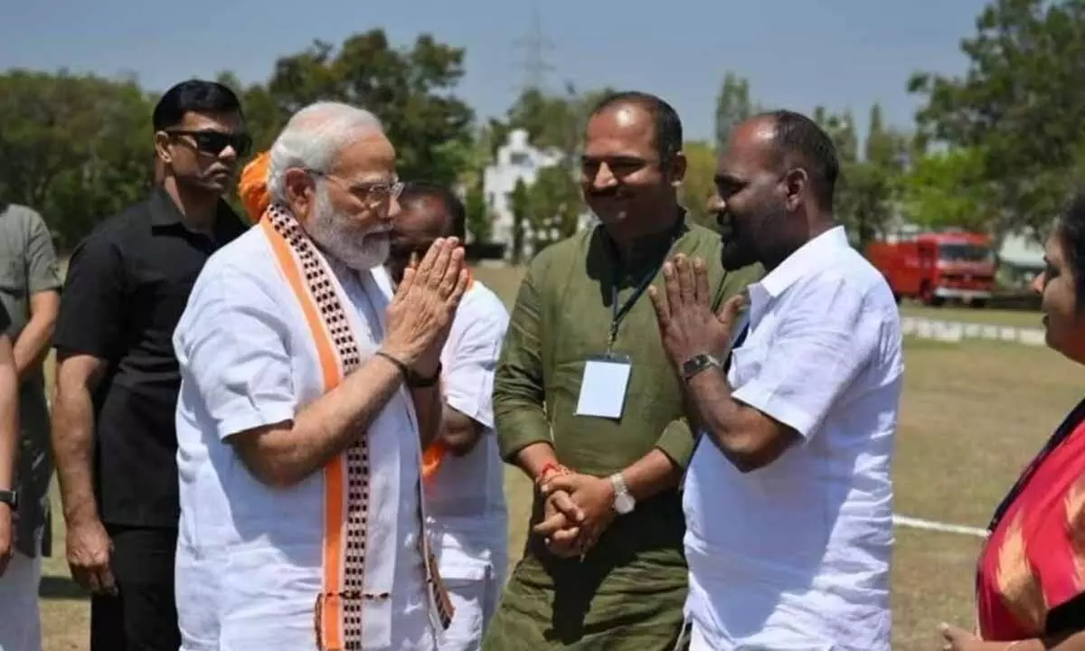 Congress slams BJP over pic of rowdy-sheeter greeting PM Narendra Modi