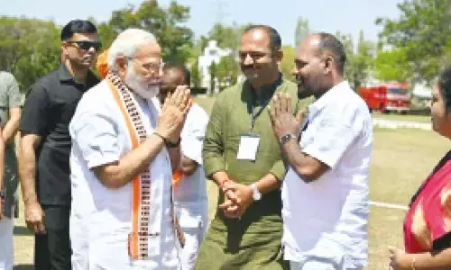 Cong slams BJP over pic of rowdy-sheeter greeting PM