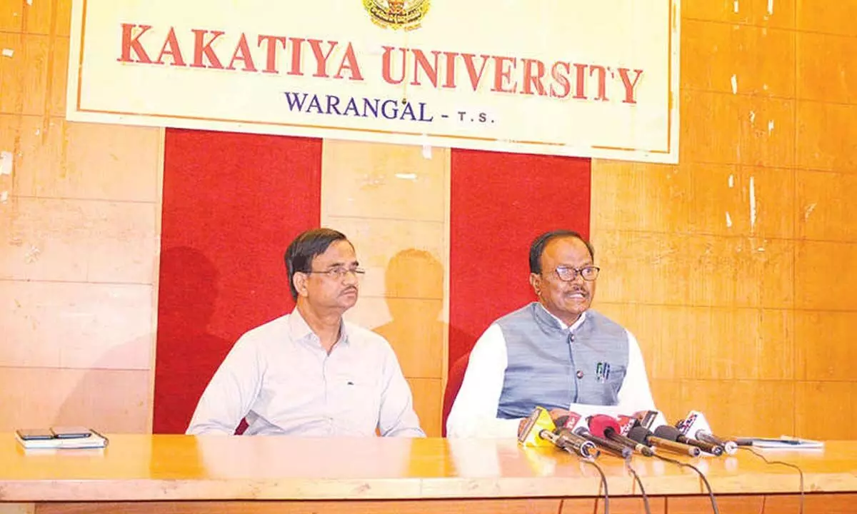Kakatiya University Vice-Chancellor Prof Thatikonda Ramesh (right) speaking to media persons in Warangal on Tuesday. KU Registrar Prof T Srinivas Rao also seen