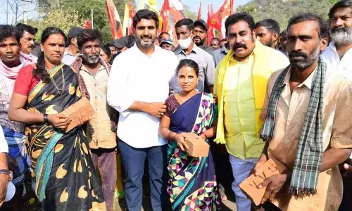 TDP national general secretary Nara Lokesh with Vaddera community people at Maddayappavaripalle village in Tamballapalle mandal in Annamayya district on Tuesday 