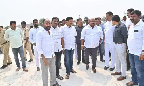 Minister G Kamalakar inspecting the integrated market construction works at Ramnagar in Karimnagar on Tuesday
