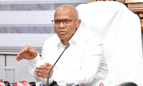 TTD EO AV Dharma Reddy speaking to the media on the success of Face Recognition Technology in room allotment in Tirumala on Tuesday