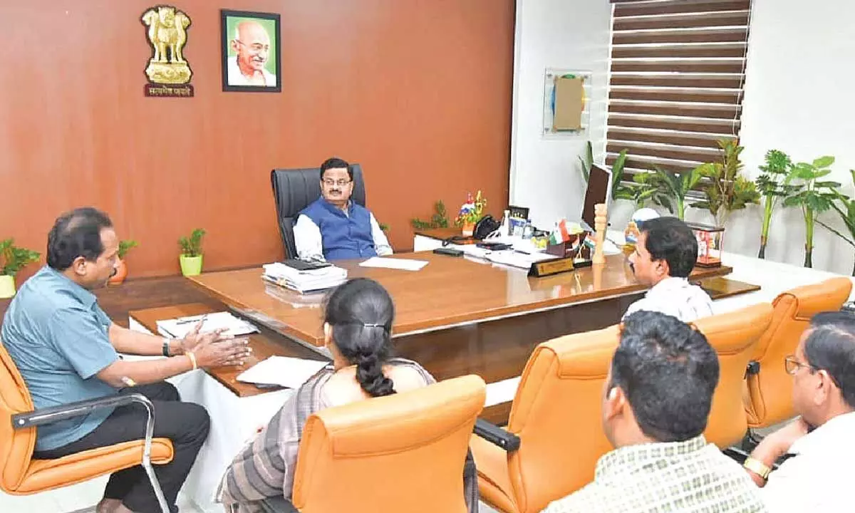 District Collector K Venkataramana Reddy holding a meeting on repolling with the officials at the Collectorate in Tirupati on Tuesday
