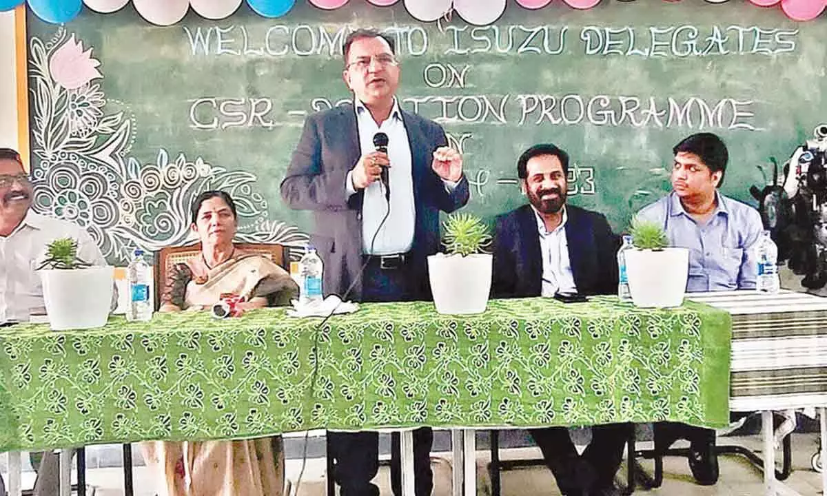ISUZU Engineering Business Centre president Rajesh Mittal addressing the students at Satyavedu Polytechnic on Tuesday. Principal Usha Devi and others are seen.