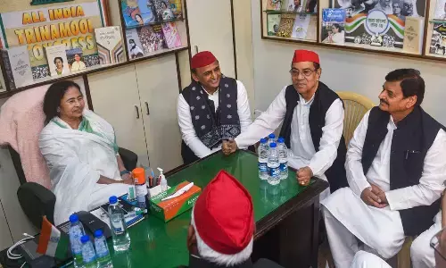 West Bengal Chief Minister Mamata Banerjee with Samajwadi Party Chief Akhilesh Yadav, national vice-president Kironmoy Nanda and party leader Shivpal Singh Yadav during a meeting, in Kolkata on Friday