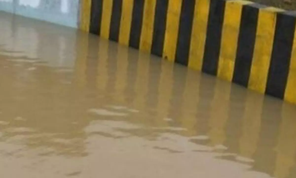 Rain water stagnated on the road at RTC complex in Srikakulam