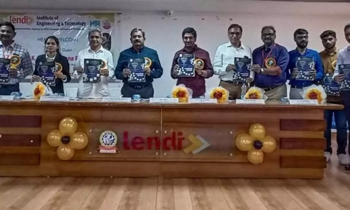Port chairman K Rama Mohan Rao and others releasing souvenir at Lendi College on Tuesday