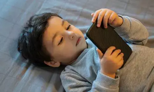 More outdoor play may cut negative effects of screen time in kids