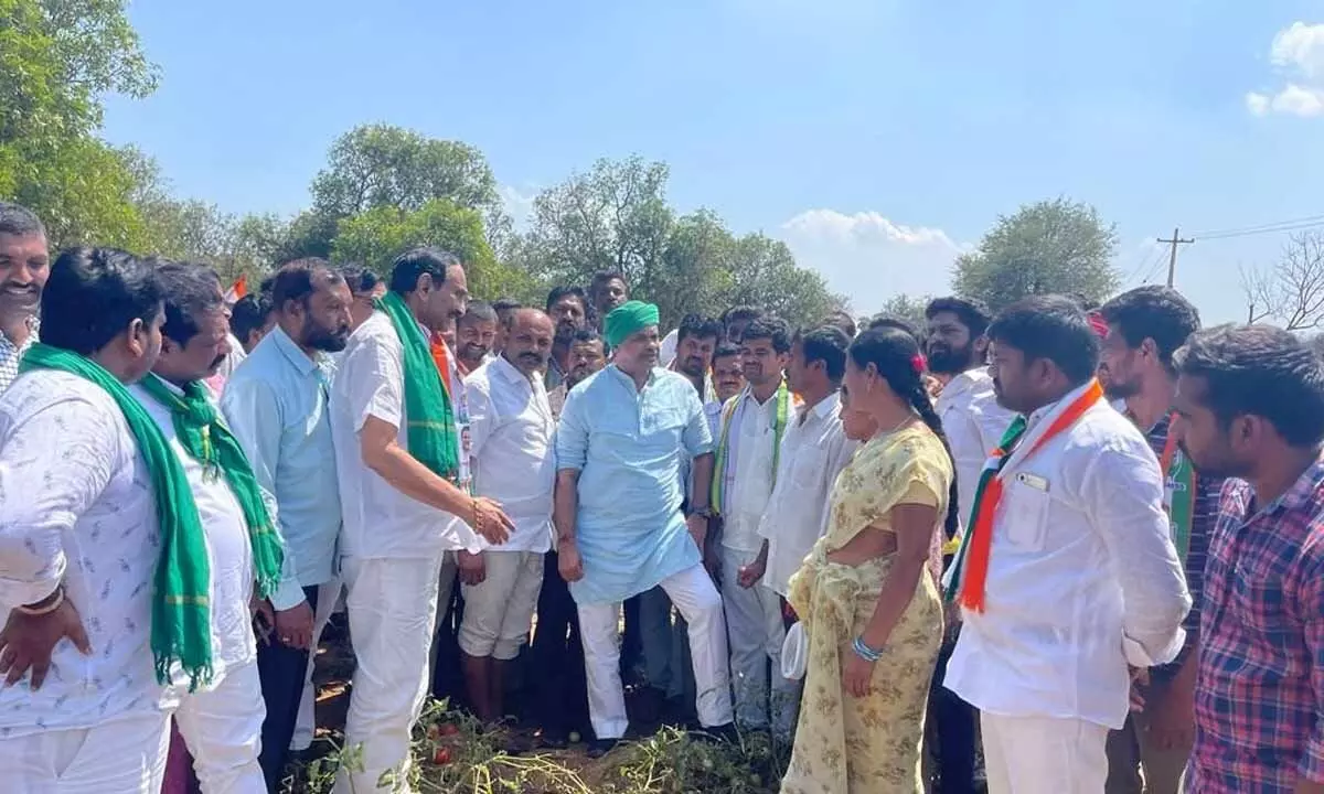 MP Komatireddy Venkat Reddy along with RDR interacting with farmers affected by hailstrom in Tungaturthi constituency on Tuesday