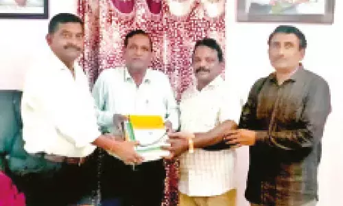 HELP donates books to AK University