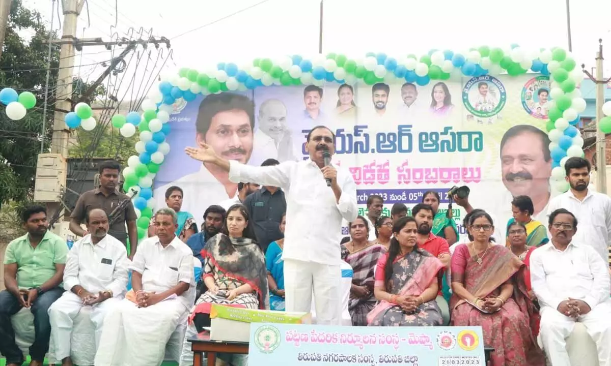 City MLA Bhuamana Karunakar Reddy addressing a meeting held to disburse cheques towards YSR Aasara scheme beneficiaries in Jeevakona in Tirupati on Sunday