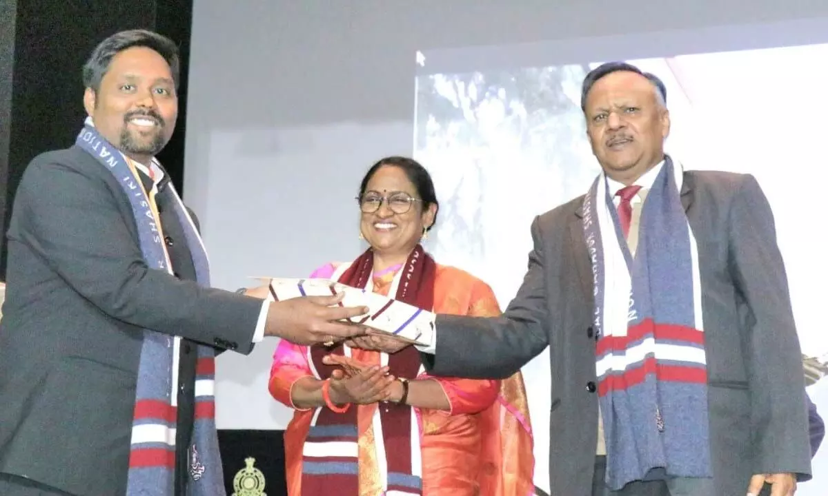 East Godavari district Joint Collector N Tej Bharat receiving first prize from LBSNAA Special Director Radhika Rastogi and Department of Personnel and Training (DoPT) ex-Secretary Ajay Mittal in Mussoorie