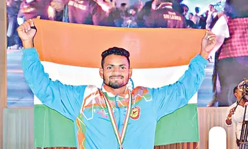 Atla Siva Nagireddy with gold medal