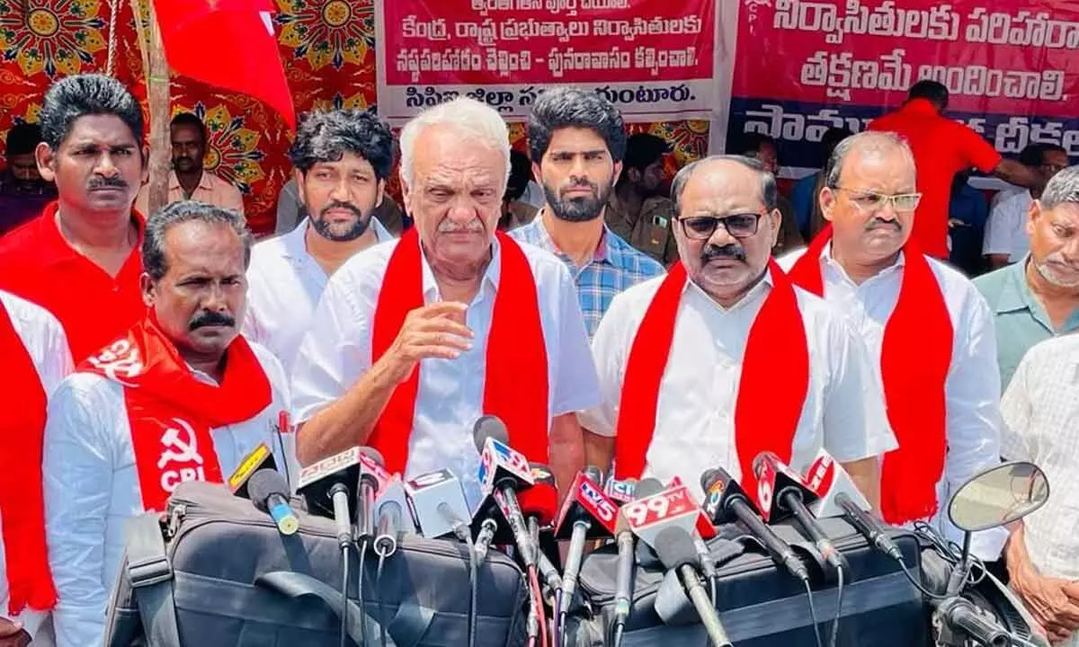 CPI national secretary K Narayana addressing the media at the Collectorate in Guntur on Tuesday