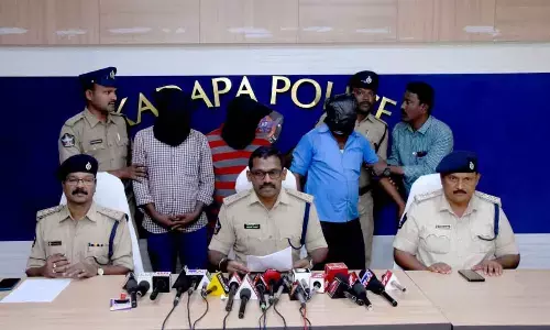 YSR District SP KKN Anburajan producing the accused before the media in Kadapa on Monday