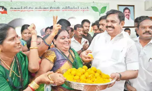 AIADMK General Secretary Edappadi K. Palaniswami celebrates with party workers after the  Madras High Court rejected all petitions filed by the deposed AIADMK leader OPanneerselvam