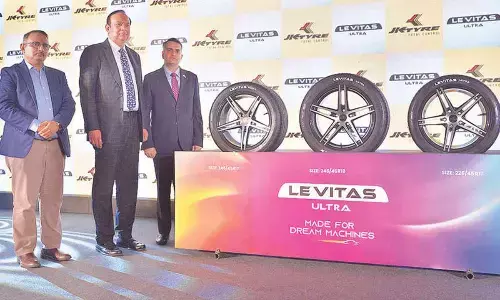 (L-R) Anuj Kathuria, president (India), Anshuman Singhania, Managing Director, JK Tyre and Industries Ltd unveiling the Levitas Ultra range of tyres in Hyderabad on Tuesday