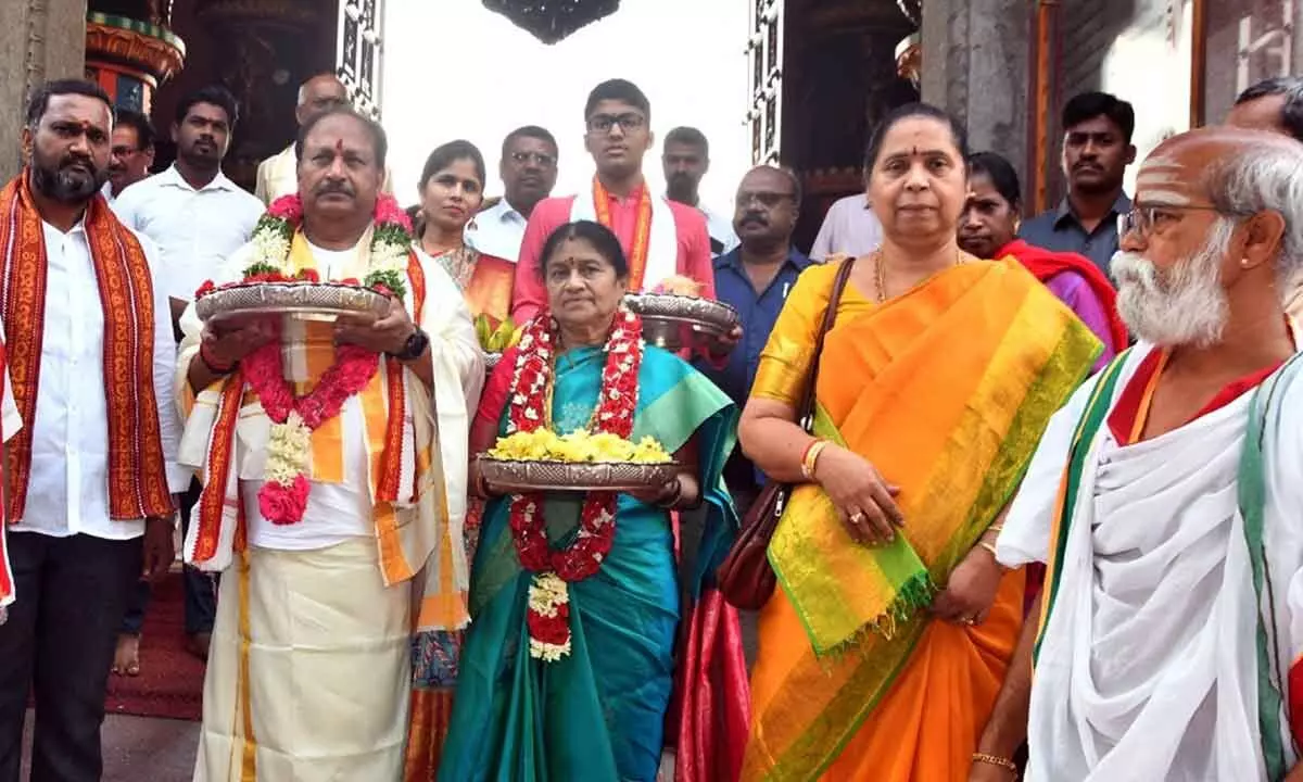 Minister for Endowments Kottu Satyanarayana along with his wife offering flowers to Goddess Kanaka Durga at Indrakeeladri on Tuesday on the occasion of Vasantha Navaratri