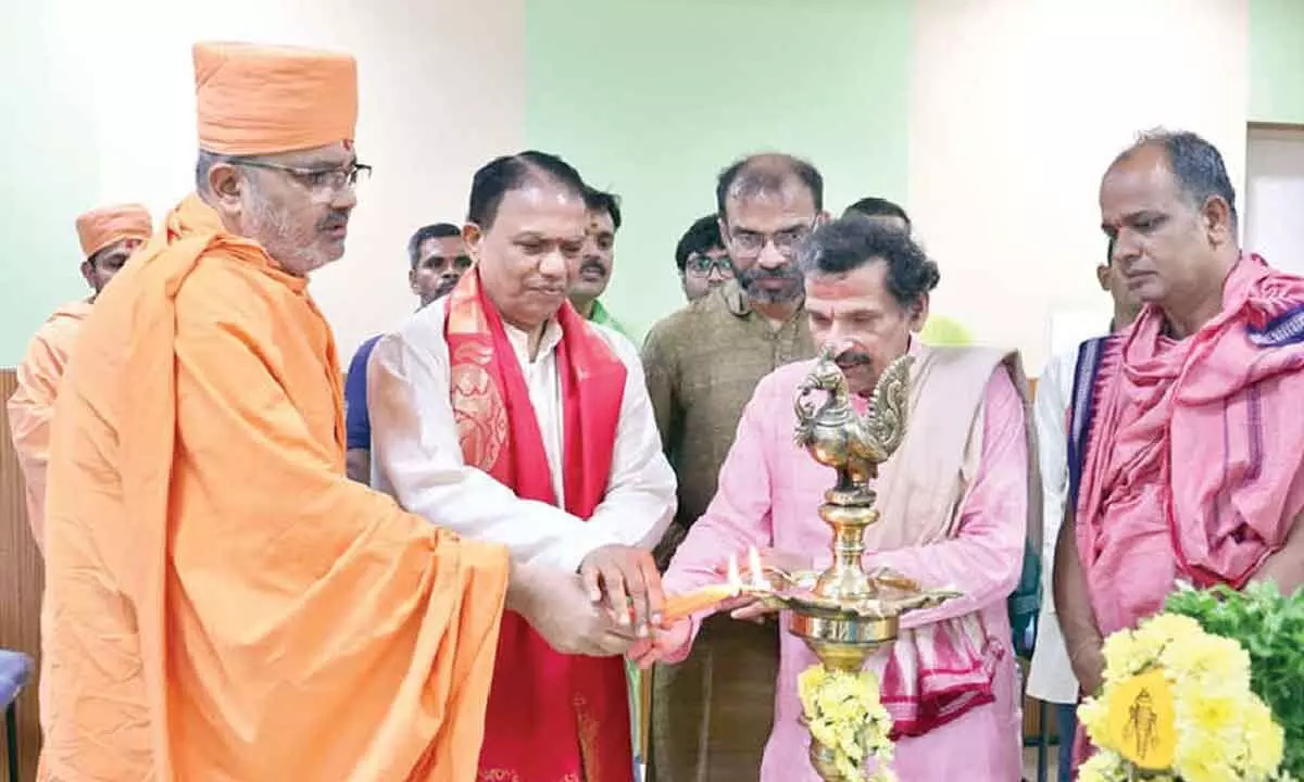 Vice-Chancellor Prof GSR Krishna Murthy, Bhadresh Dash Swami and others lighting the lamp to mark the inauguration of the national seminar at the National Sanskrit University in Tirupati on Tuesday