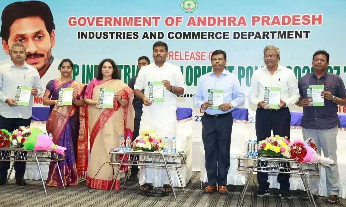 IT minister G Amarnath, director of industries G Srijana, among others, releasing the New Industrial Policy in Visakhapatnam.