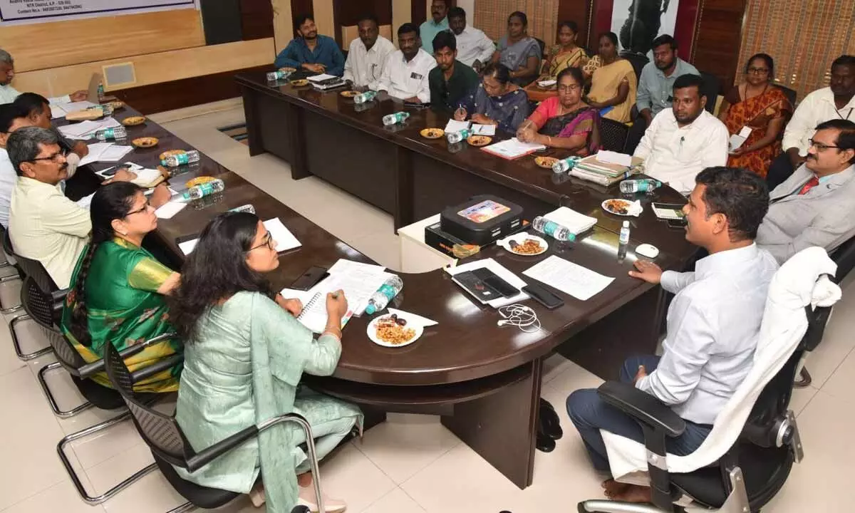 District Collector S Dilli Rao holding a review meeting at the Collectorate in Vijayawada on Wednesday