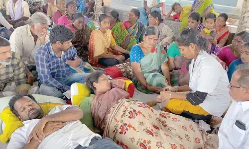Villagers of Chindepalli in Yerpedu mandal protesting against the blockade of the road by a factory management on Wednesday