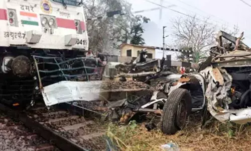 Duronto express rams Tata vehicle on railway track near Bhimadole