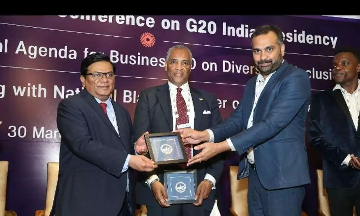Karimnagar District Collector RV Karnan receiving a memento at DICCI National Conference on G20 India Presidency conference held in New Delhi on Thursday