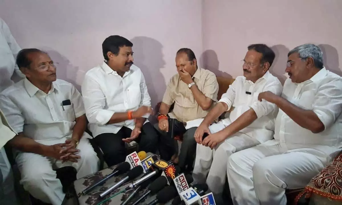BJP leader Sujana Chowdary, former Ministers and TDP leaders Kanna Lakshminarayana and  Alapati Rajendra Prasad at Alapati’s residence in Tenali town on Sunday