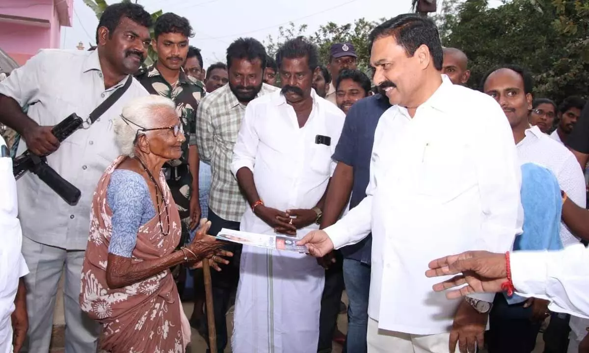 Agriculture Minister Kakani Govardhan Reddy interacting with people during Gadapa Gadapaku Mana Prabhutvam at Punjulurupadu village in Venkatachalam mandal on Sunday