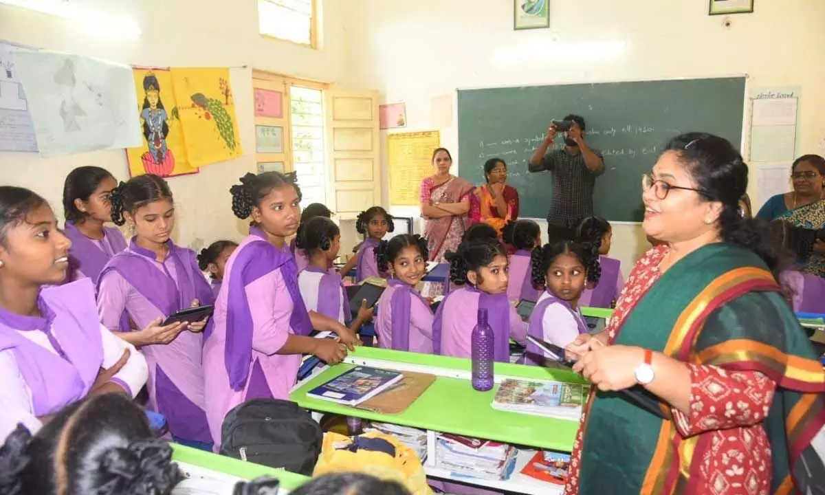Collector A Surya Kumari interacting with KGBV students  in Nellimarla