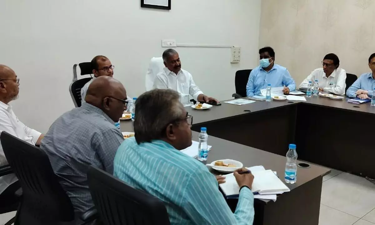 Minister for energy, forest, environment and mines and geology Peddireddi Ramachandra Reddy conducting a review with mines and geology and APMDC officials at his camp office in Vijayawada on Tuesday