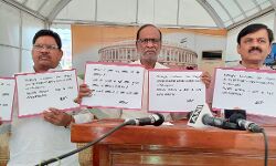 BJP MPs hold placards condemning the arrest of TS BJP chief Bandi Sanjay Kumar. BJP MPs hold placards condemning the arrest of TS BJP chief Bandi Sanjay Kumar.