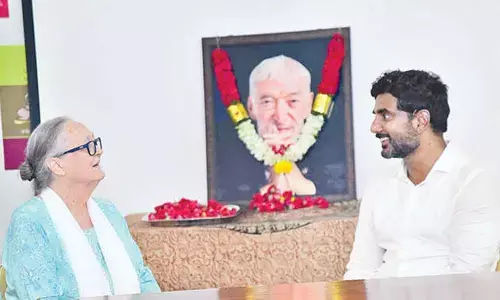 TDP national general secretary Nara Lokesh with Anne Ferror in Anantapur on Wednesday