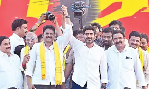 Nara Lokesh with Uravakonda MLA Payyavula Keshav at a public meeting at Kuderu in Anantapur district on Wednesday