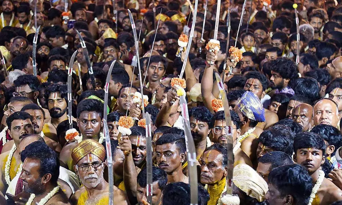 Devotees throng in at Karaga festival for landmark procession
