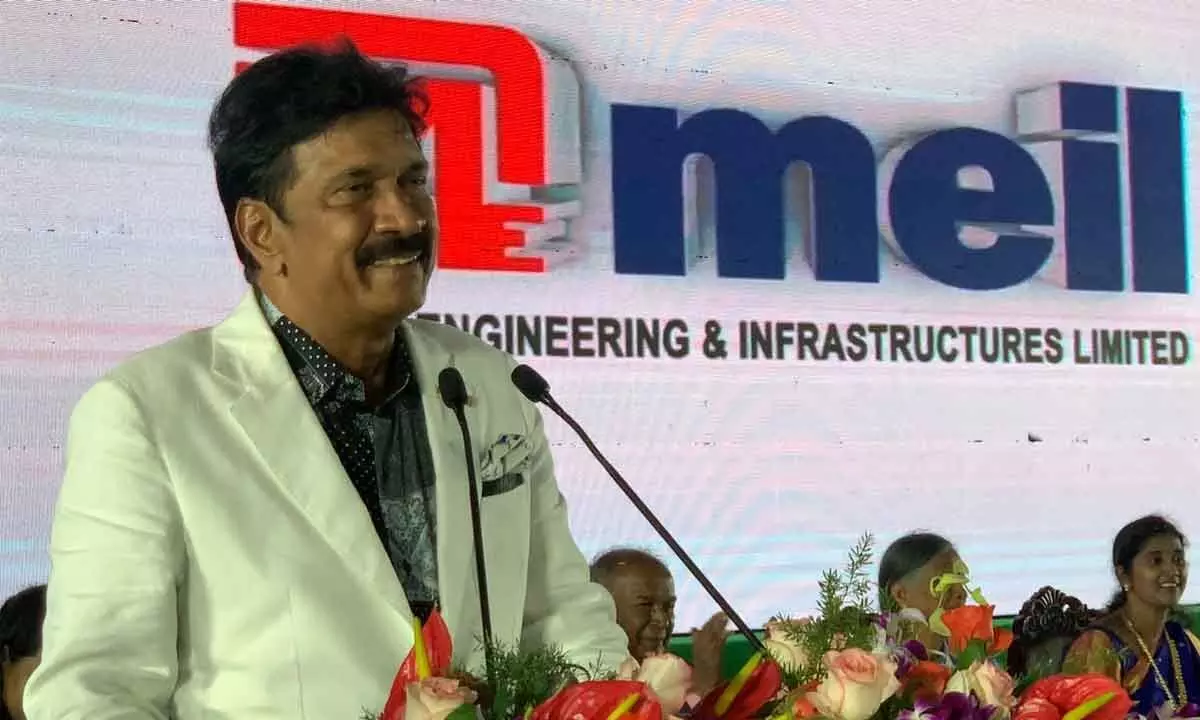 Megha Engineering and Infrastructure Limited chairman PP Reddy addressing the people of Jamulapalli near Pithapuram on Friday after inaugurating a bridge