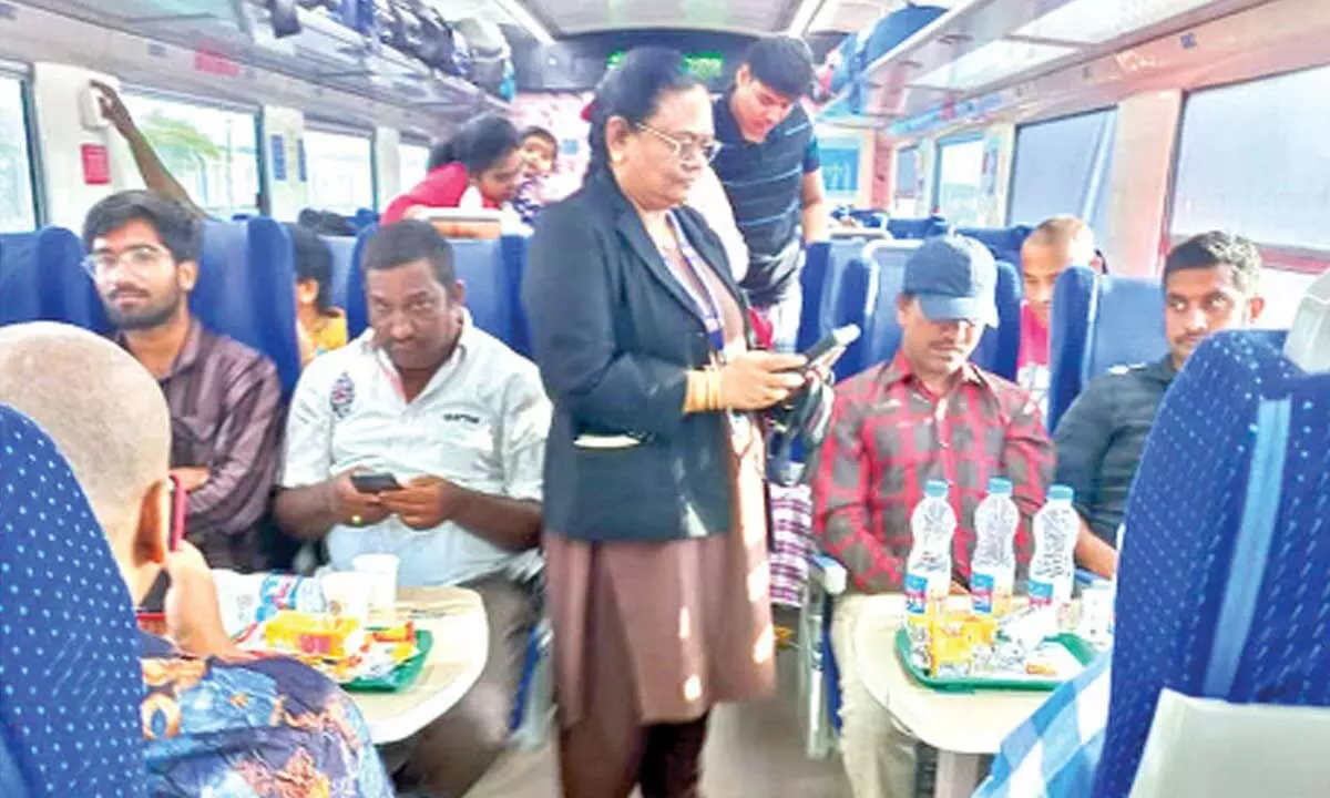 Passengers on board the Vande Bharat Express from Tirupati to Secunderabad on Sunday.