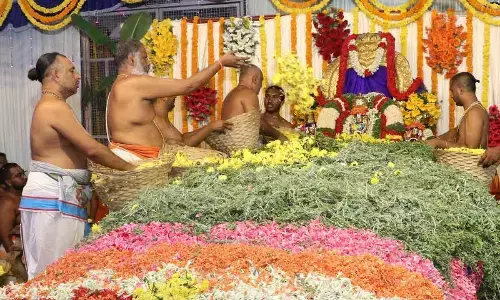 Priests performing Pushpa Yagam at Sri Kodandarama Swamy temple at Vontimitta in YSR district on Sunday