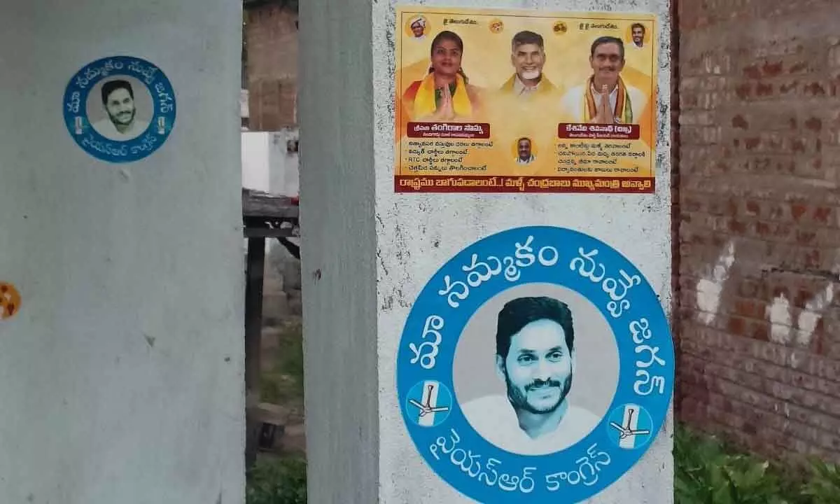 Vijayawada: Parties wage sticker war claiming households support