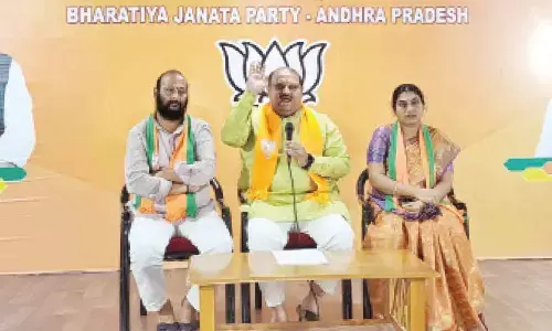 BJP State general secretary V Suryanarayana Raju addressing the media at the party office in Vijayawada on Monday