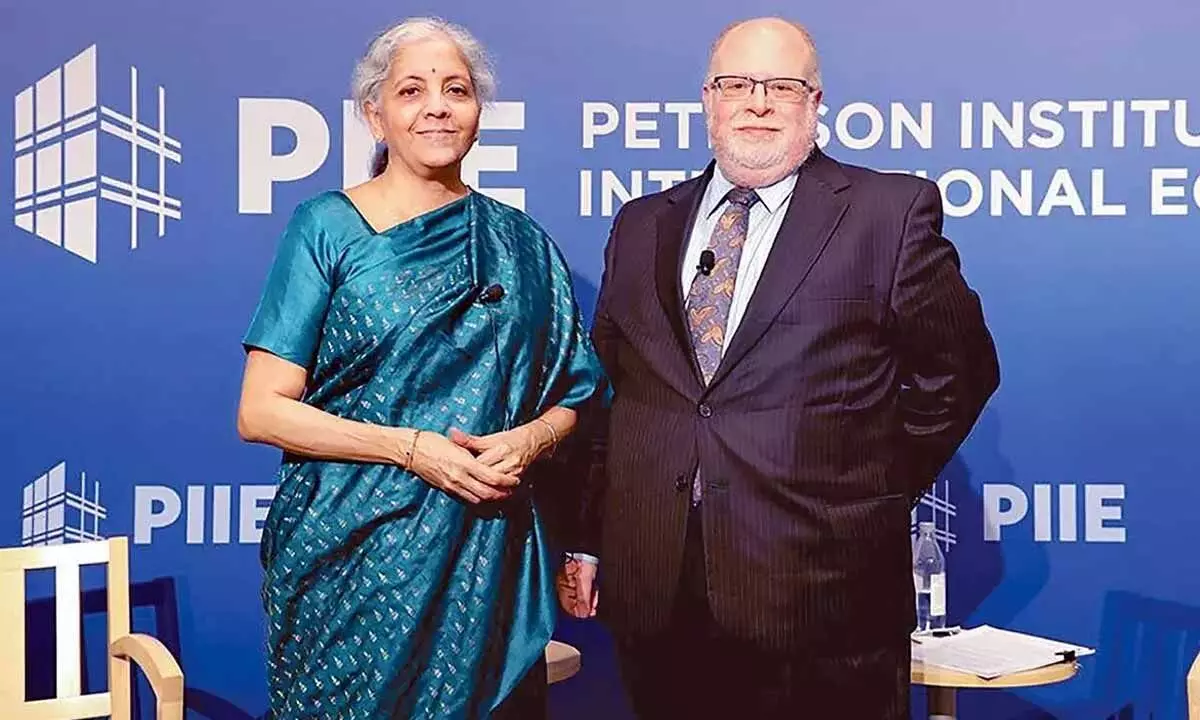 Union Finance Minister Nirmala Sitharaman with PIIE President Adam Posen at the Peterson Institute for International Economics, in Washington on Tuesday